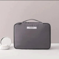 Mandotos Chic Beauty Bag Organizer with multiple compartments for cosmetics and toiletries, compact and stylish for travel.