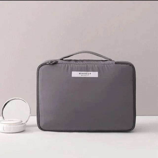 Mandotos Chic Beauty Bag Organizer with multiple compartments for cosmetics and toiletries, compact and stylish for travel.