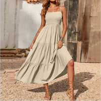 Mandotos chic chiffon layered swing dress displayed on a hanger, showcasing its flowing fabric and stylish design.