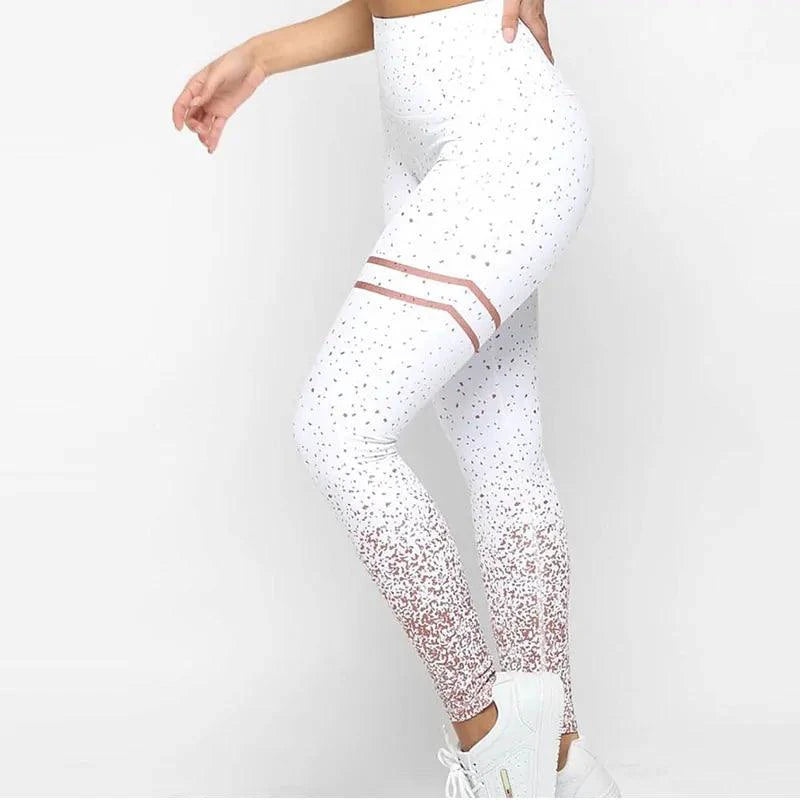 Mandotos chic gold print leggings featuring stylish gold pattern on black stretchy fabric for a fashionable look.