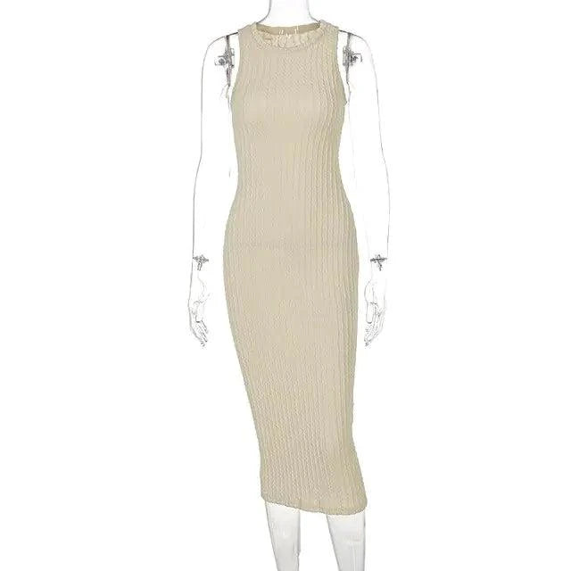 Mandotos chic knitted tank sweater dress featuring a sleeveless design and cozy knit texture, perfect for stylish layering.