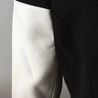 Mandotos chic leather blazer coat featuring a tailored fit, classic lapels, and stylish design, perfect for a sophisticated look.