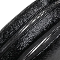 Mandotos chic leather circle purse with a sleek design and adjustable strap, perfect for stylish everyday carry.