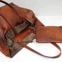 Mandotos chic leather tote handbag with sturdy handles, stylish design, and spacious interior for everyday use.