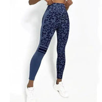 Mandotos chic leopard print high-rise yoga tights shown on a model, featuring a snug fit and stylish pattern for activewear.