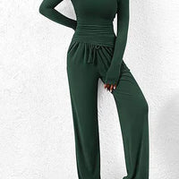 Mandotos chic long-sleeve trousers set featuring stylish top and matching pants, perfect for modern casual wear.