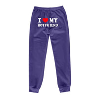 Mandotos Chic Love Print Trousers with stylish heart pattern, fitted waistband, and relaxed fit for a trendy casual look.