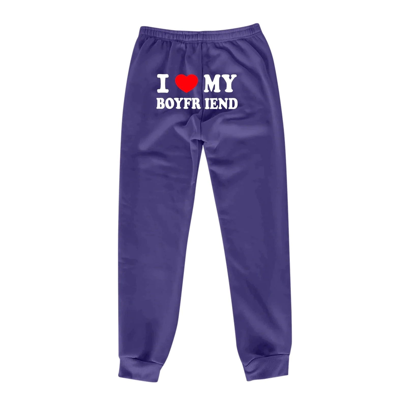 Mandotos Chic Love Print Trousers with stylish heart pattern, fitted waistband, and relaxed fit for a trendy casual look.
