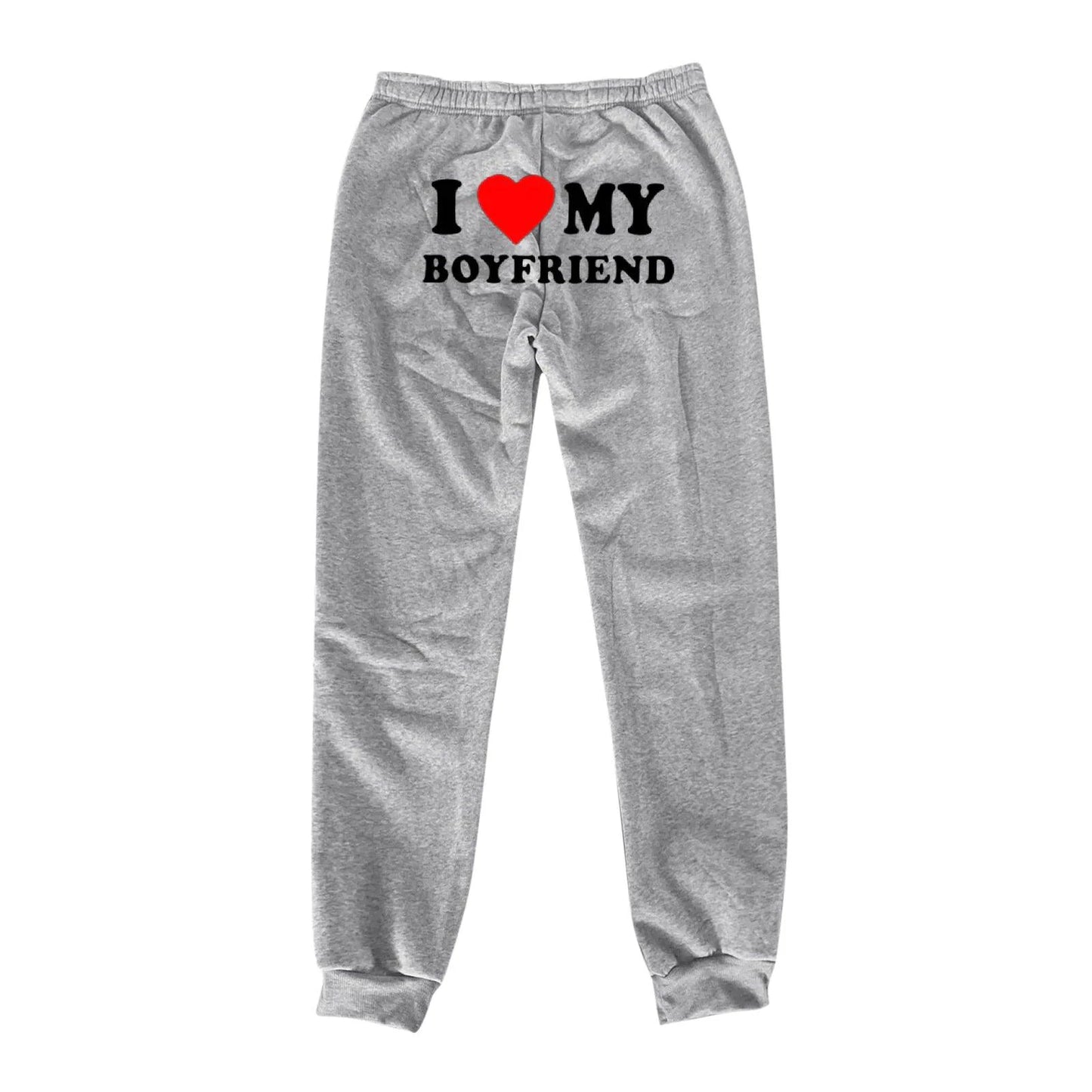 Mandotos Chic Love Print Trousers featuring stylish heart pattern, high-waisted design, and relaxed fit for casual wear.