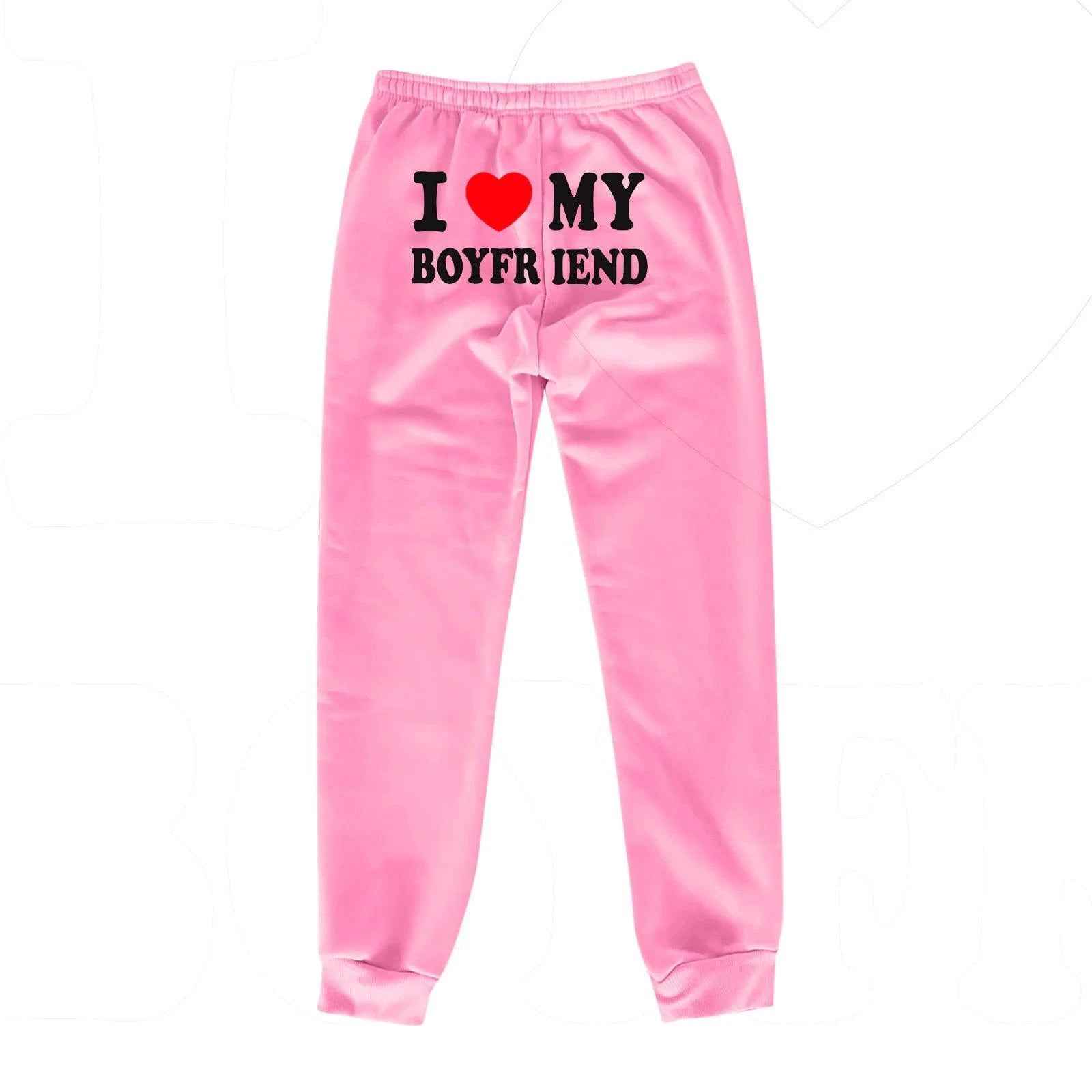 Mandotos Chic Love Print Trousers featuring a stylish heart pattern, slim fit design, and contemporary fashion for women.