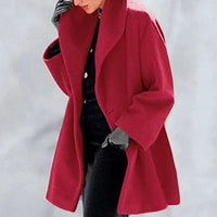 Mandotos chic multi-shade oversized cardigan featuring a cozy, relaxed fit with vibrant color blocks and soft knit fabric.