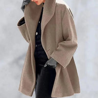 Mandotos chic multi-shade oversized cardigan with soft knit fabric, featuring a relaxed fit and colorful patchwork design.