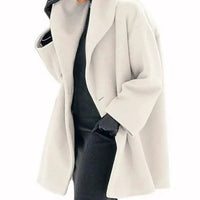 Mandotos oversized cardigan with multi-shade knit design, featuring a relaxed fit and cozy style.