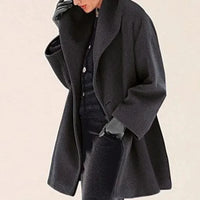 Mandotos oversized cardigan with multiple shades, featuring a relaxed fit and cozy knit fabric in various colors.