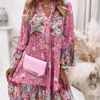 Mandotos chic pleated long sleeve dress with a fitted waist and flowing skirt, stylish and perfect for elegant occasions.