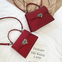 Mandotos chic PU leather sling bag with adjustable strap and stylish design, perfect for casual or evening use.