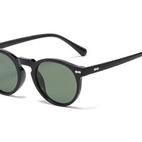 Mandotos chic round UV-block sunglasses with black frames and dark tinted lenses, stylish and protective for sunny weather.