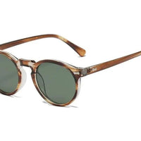 Mandotos chic round UV-block sunglasses with black frames and tinted lenses, stylish eyewear for sun protection.