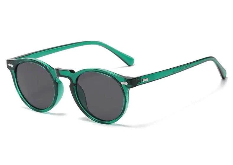 Mandotos chic round UV-block sunglasses with black frames and dark tinted lenses, stylish and protective for sunny days.