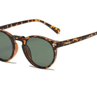 Mandotos chic round UV-block sunglasses with black frames and dark lenses, stylish accessory for sun protection