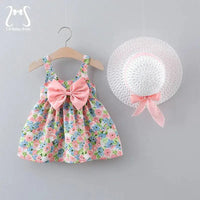 Chic toddler girl summer duo dresses by MANDOTOS featuring colorful, lightweight fabrics and playful designs for warm weather.
