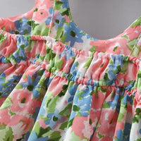 Chic toddler girl summer duo dresses by MANDOTOS, featuring colorful patterns and lightweight fabric perfect for warm weather.