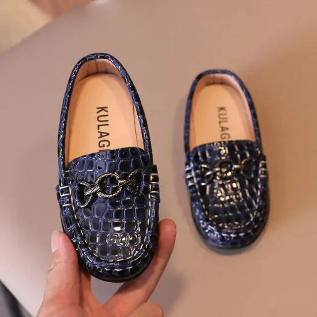 Mandotos Chic Toddler Leather Kicks in soft brown with white soles, perfect for stylish young children.