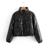 Mandotos chic winter PU leather jacket featuring a stylish design, perfect for cold weather, shown in a close-up view.