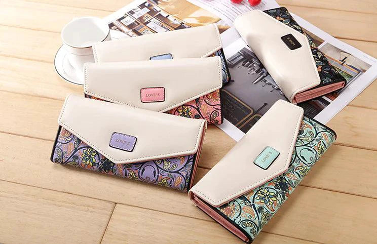Mandotos women's leather clutch wallet and card holder, stylish compact accessory with multiple card slots and a sleek design.