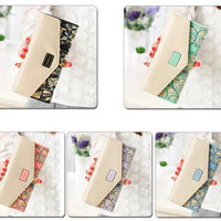 Mandotos women's leather clutch wallet with card holder, featuring a sleek design and compact style for everyday use.