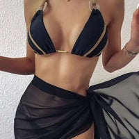 Mandotos ChicWave elegant chiffon sarong draped for beach, showcasing lightweight, flowy fabric perfect for seaside style.