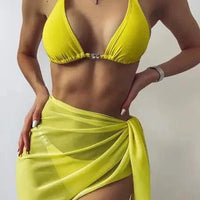 Mandotos ChicWave elegant chiffon sarong draped over a model, showcasing lightweight, flowing beachwear for stylish seaside outings.