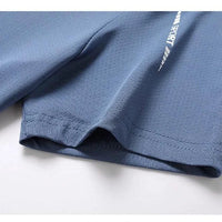 Mandotos men's quick-dry running T-shirt, breathable outdoor sports tee ideal for hiking, fishing, and summer activities.