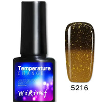 Mandotos Chromatic Nail Adhesive bottle with applicator tip, clear adhesive for professional nail enhancements and repairs.