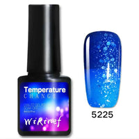 Mandotos Chromatic Nail Adhesive bottle with applicator, clear formula for strong, long-lasting nail bond.