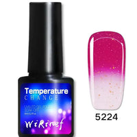 Mandotos Chromatic Nail Adhesive bottle with applicator brush, designed for durable nail art and false nail application.
