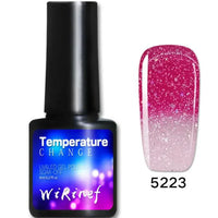 Mandotos Chromatic Nail Adhesive bottle with applicator for strong, long-lasting nail glue and adhesion.
