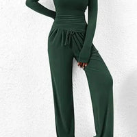 Mandotos City Comfort Asymmetrical Ensemble featuring a stylish, modern outfit with layered fabrics and a contemporary design.
