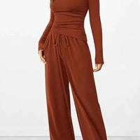 Mandotos City Comfort Asymmetrical Ensemble featuring stylish layered top and matching pants, casual urban wear for women.