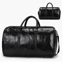 Mandotos Classic Leather Duffel Bag with sturdy handles and spacious interior, ideal for travel and weekend trips.