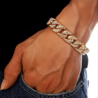 Mandotos Clyde Elegance gold bracelet with intricate design and shiny finish, stylish jewelry accessory for women.