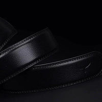Mandotos contemporary leather belt with sleek design, brown leather strap, and metal buckle for stylish casual wear.