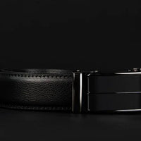 Mandotos contemporary leather belt with sleek design and adjustable buckle, made from genuine leather for a stylish look.