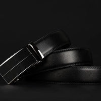 Contemporary MANDOTOS leather belt with sleek design and polished finish, shown in close-up view.