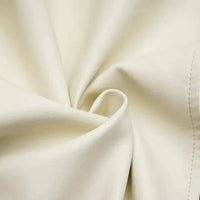 Mandotos contrast vegan leather jacket with stylish black and white panels, featuring a modern, sleek design.