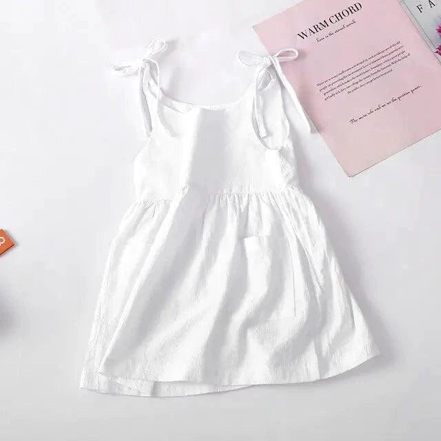 Mandotos Cotton Chic Toddler Sundress featuring a lightweight, breathable fabric with a floral pattern and sleeveless design.