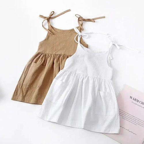 Cotton Chic Toddler Sundress by MANDOTOS featuring lightweight fabric, sleeveless design, and cute floral pattern for warm weather.
