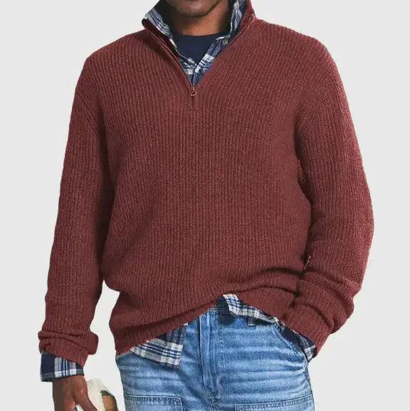 Mandotos Cozy Zip-Up Knit Sweater displayed on a hanger, featuring a soft, textured fabric and a front zipper detail.