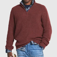 Mandotos Cozy Zip-Up Knit Sweater displayed on a hanger, featuring a soft knit texture and a front zipper for casual comfort.