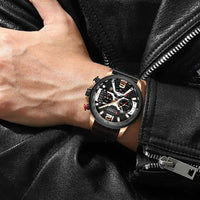 Mandotos Curren Chono 2022 Lux-Watch with black leather strap, silver dial, and chronograph features displayed on a wrist.